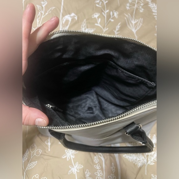 A black and grey purse. - Picture 2 of 3